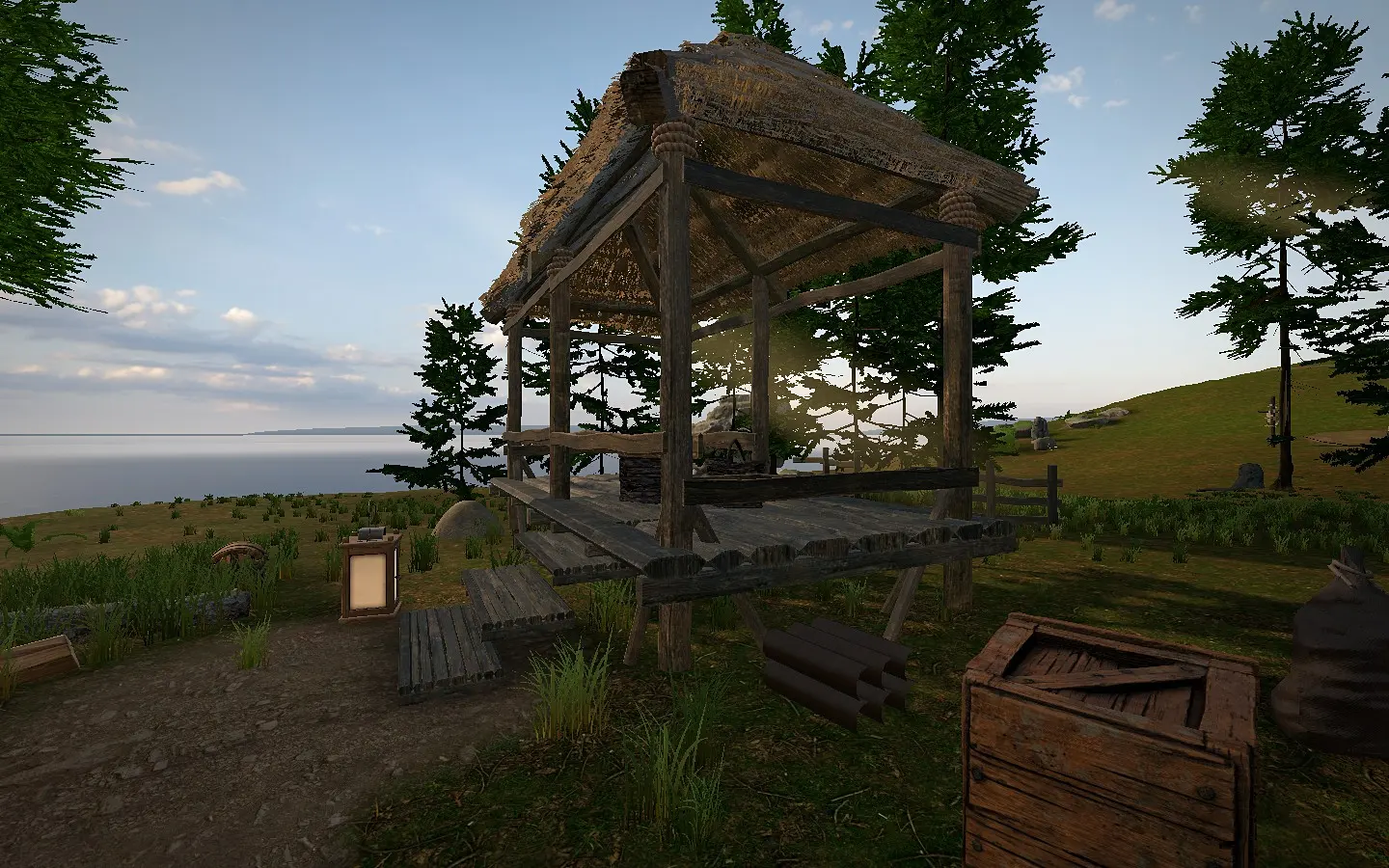 The humble starter shelter: an open-sided timber frame under a thatched roof.